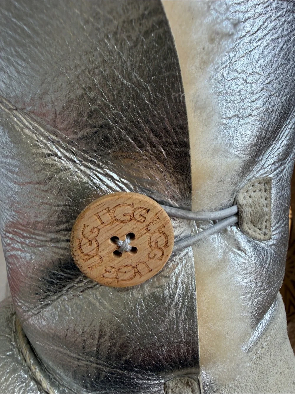 metallic silver UGG Bailey Button boots